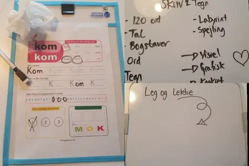 2 lommer med tusch og en lille whiteboard tavle.